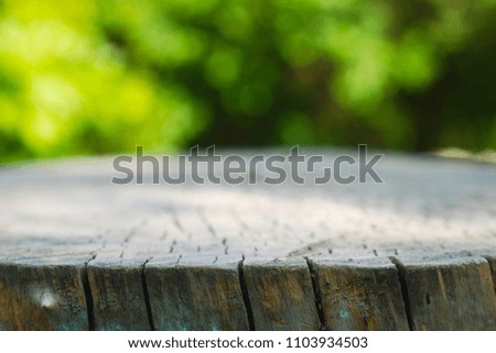 Rustic Wooden Floor Board and Bokeh Blur Summer Garden Background Copy Space