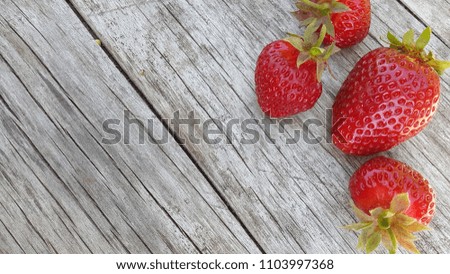 Strawberry. Strawberry berries. Strawberry berries on woody background Photo berries of strawberries