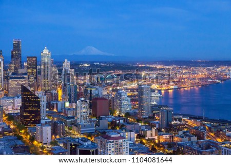 Seattle Cityscape ,View of downtown Seattle and Mount rainier at night in Seattle Washington, USA