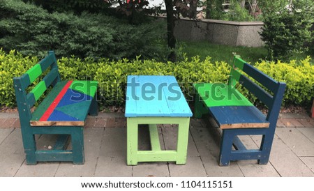 Colorful chairs at garden.