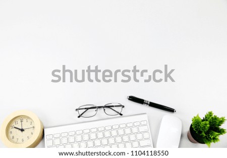 Work space Mock up : Desk space with glasses,keyboard,mouse. desk with copy space for your text.