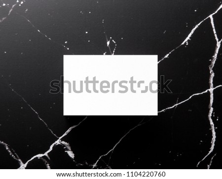Photo of white business cards on marble. Template for branding identity isolated on marble background. For graphic designers presentations and portfolios marble premium luxury mock-up. 