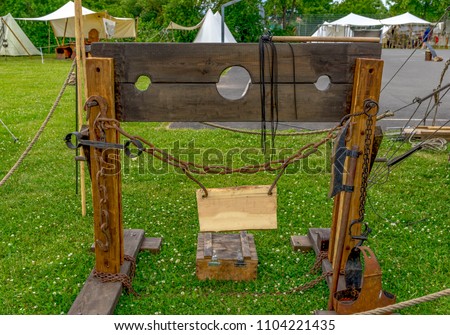 Reconstruction of an outdoor pillory at a medieval festival
