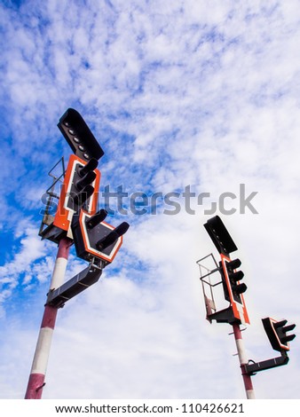 Train traffic light with blue sky back ground