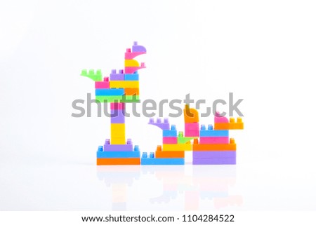 Plastic building blocks isolated on white background