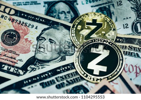 Close up of top important cryptocurrencies which dollar bank note in background. which including of Bitcoin, Ethereum, Litecoin, Dash, Zcash and Ripple coin. Business and financial as concept.