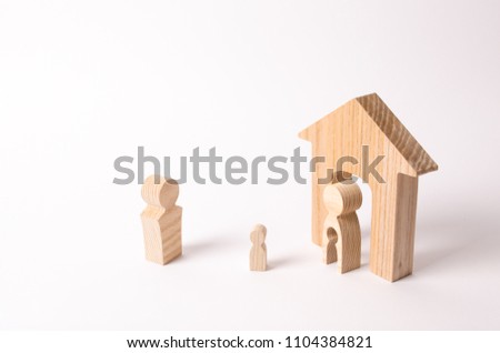 Parents share child in a divorce. The father takes the child from his mother. The child decides with which parent to live. The concept of a parent's choice, litigation. Father visits his son. Royalty-Free Stock Photo #1104384821