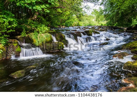 Waterfalls, Bridges and Reflections in River Lowther in the Lake District, Great Britain