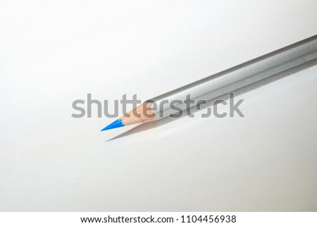 close up of blue and gray color pencil
