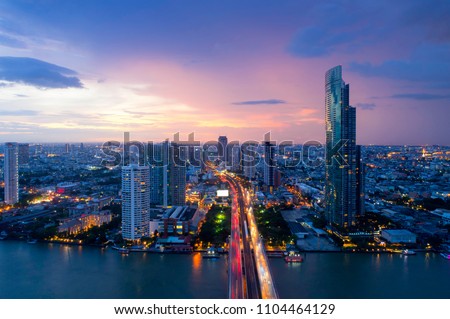 Aerial view of Bangkok modern office buildings, condominium, living place in Bangkok city downtown with sunset scenery, Bangkok is the most populated city in Southeast Asia.Bangkok , Thailand Royalty-Free Stock Photo #1104464129