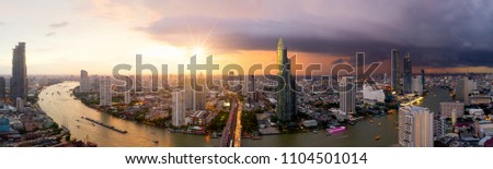 Aerial view of Bangkok modern office buildings, condominium, living place in Bangkok city downtown with sunset scenery, Bangkok is the most populated city in Southeast Asia.Bangkok , Thailand Royalty-Free Stock Photo #1104501014