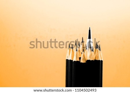 Pencil stands out as a pen standing out from others.