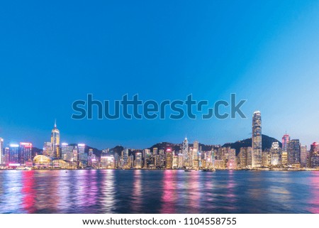 Victoria harbor of Hong Kong city at dusk