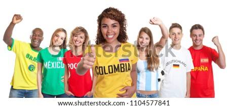 Laughing soccer supporter from Colombia with fans from other countries on isolated white background for cut out - Translation: Brazil, Mexico, Russia, Colombia, Germany, Spain 