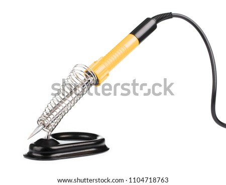 Soldering iron stand with electric solder isolated on a white background Royalty-Free Stock Photo #1104718763