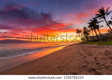 Kaanapali Beach on Maui at Sunset Royalty-Free Stock Photo #1104786314