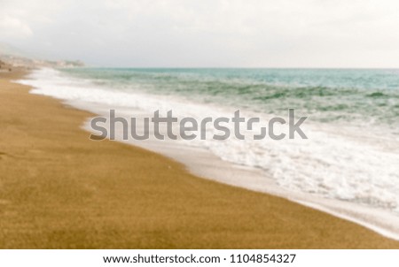 Defocused background of a scenic beach on the thyrrenian coastline in Calabria, Italy. Intentionally blurred post production for bokeh effect