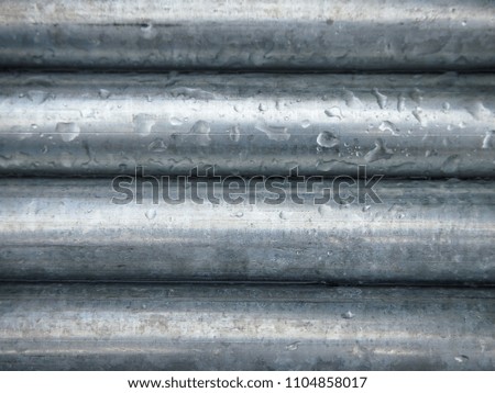 Group of aluminum tubing lines, close up  