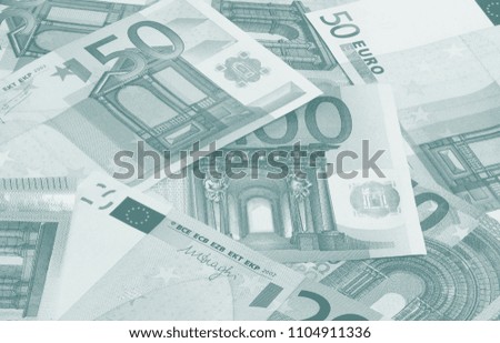 Euro money of different denominations duotone abstract background