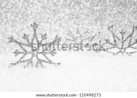 Abstract Christmas silver background with snowflakes