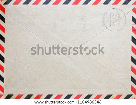 Vintage envelope with postal stamp Royalty-Free Stock Photo #1104986546
