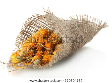 dried calendula flowers in sacking, isolated on white