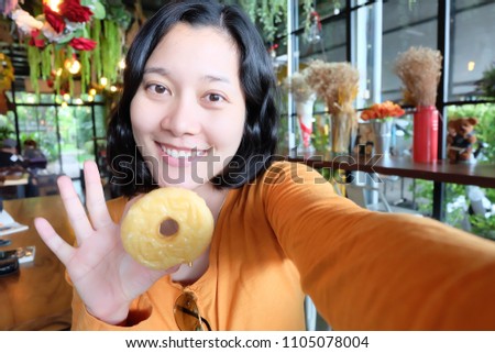 selfie Asian woman, self portrait a sweet donut