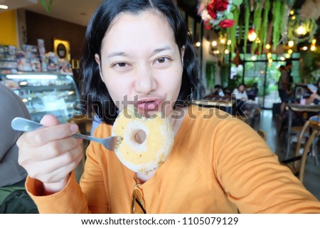 selfie Asian woman, self portrait a sweet donut