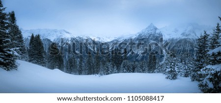 Framed mountain range in Switzerland. Piz Ela winter landscape. High resolution, 37 megapixels. Royalty-Free Stock Photo #1105088417