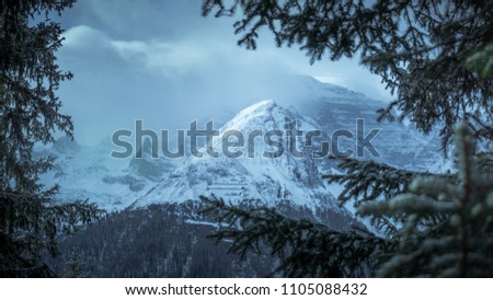 Close-up, framed view over mountain in Switzerland Royalty-Free Stock Photo #1105088432