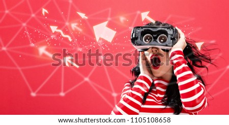 Arrows with young woman using a virtual reality headset