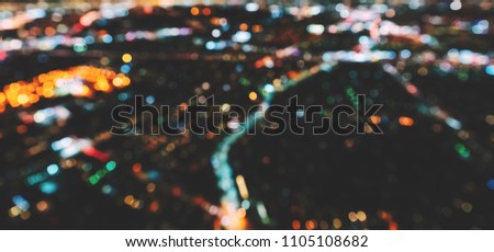 Aerial blurred view of a massive highway in Los Angeles, CA at night