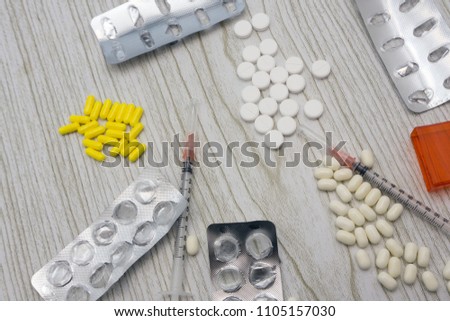 pharmaceutical colorful pills medicine antibiotics tablets medicine in blister packaging on white background