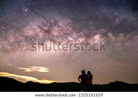 Sweet couples and stars and the Milky Way in the sky