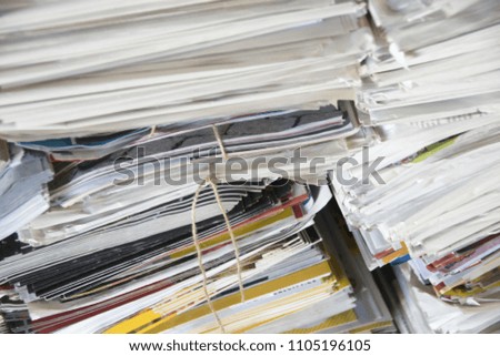 background of paper textures piled ready to recycle