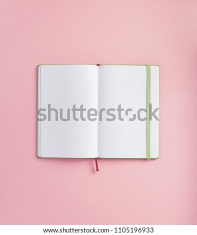 notepad at abstract background surface