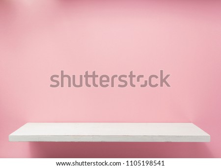 woden shelf at abstract wall background surface