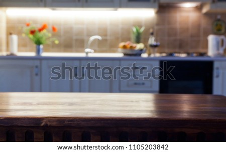 blurred kitchen interior and napkin and desk space