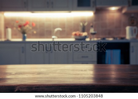 blurred kitchen interior and napkin and desk space