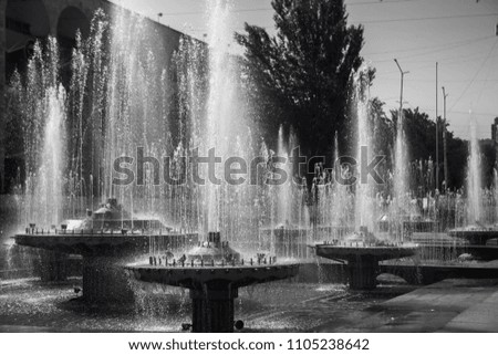 Black and white photo of a fountain in Republic of Kyrgyzstan.