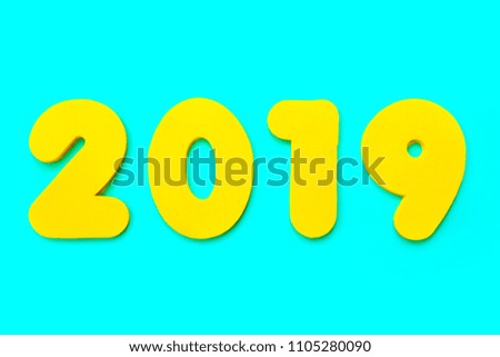 A yellow 2019 heading over a blue background.