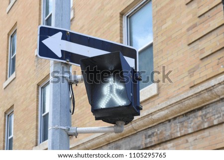 Close up of a pedestrian green signal, traffic lights