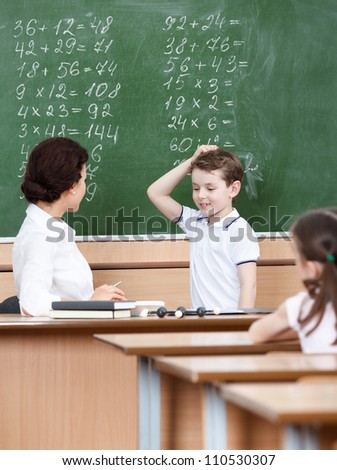 Math teacher questions the pupil who doesn't know the answer