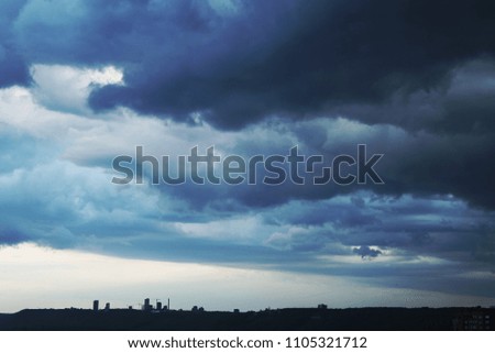 Storm rain sky over the city.
