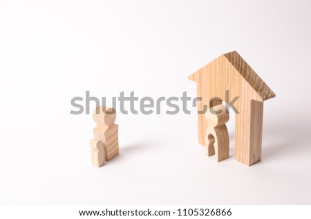Parents share child in a divorce. The father takes the child from his mother. The child decides with which parent to live. The concept of a parent's choice, litigation. Father visits his son. Royalty-Free Stock Photo #1105326866