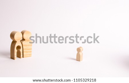 Wooden figures of a man and a woman with a void inside the body in the form of a child. Infertility in a couple. Loss of a single child. Medical problems. The couple wants to have a baby.