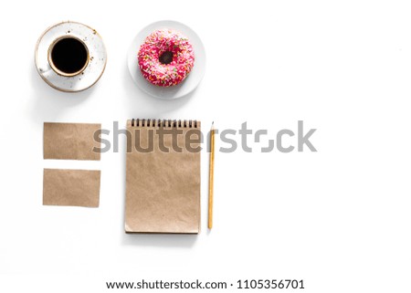 Mockup business brand template. Blank stationery made of craft paper for branding near coffee and donut on white background top view mockup pattern copy space