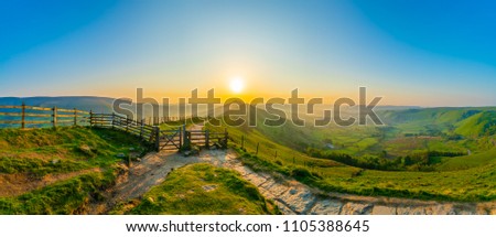 The Great Ridge panorama at sunrise - Mam Tor hill in Peak District Royalty-Free Stock Photo #1105388645