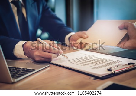 corruption concept ,The contractor provides special compensation to the authorized signatory to the agreement. Royalty-Free Stock Photo #1105402274