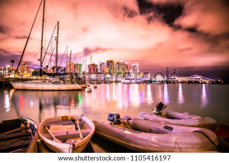 Beautiful San Diego California sunset with skyline, boats and water